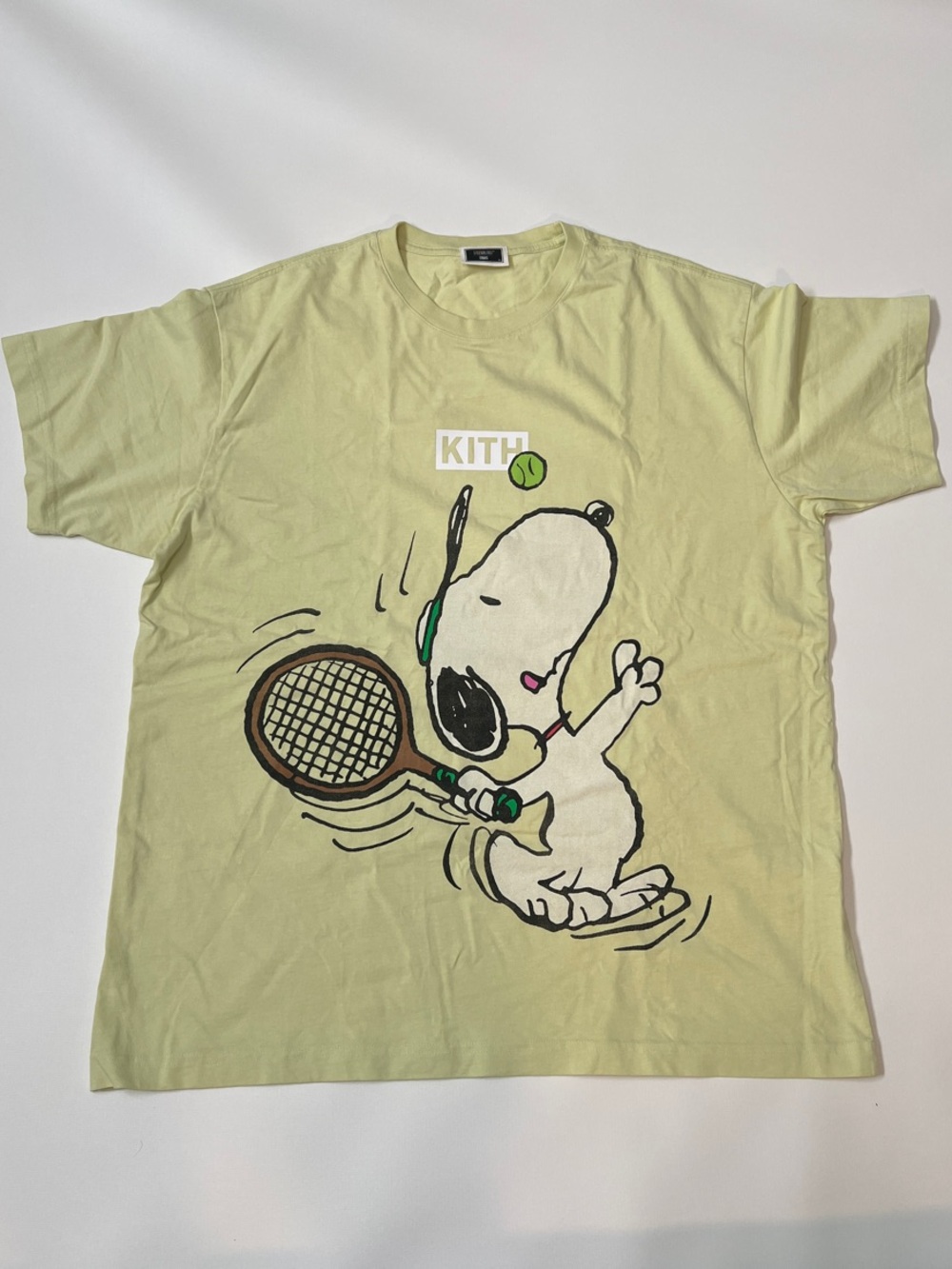 Kith Peanuts Light Green Snoopy Tennis Graphic Tee